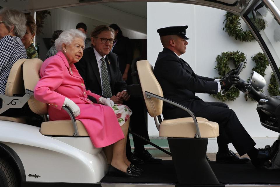 The Queen toured the Chelsea Flower Show by buggy and was joined by Keith Weed, President of the Royal Horticultural Society (Dan Kitwood/PA) (PA Wire)