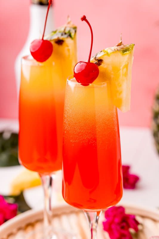 <p>Sugar and Soul</p><p>Transport yourself to a Hawaiian island with this tropical cocktail.</p><p><strong>Get the recipe: <a href="https://www.sugarandsoul.co/hawaiian-mimosa" rel="nofollow noopener" target="_blank" data-ylk="slk:Hawaiian Mimosa;elm:context_link;itc:0;sec:content-canvas" class="link rapid-noclick-resp">Hawaiian Mimosa</a></strong></p>