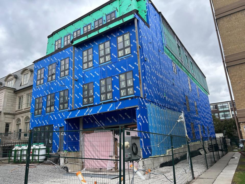 The project, which would see up to eight condos over four floors, has been under construction since 2017, but has seen little regular activity in at least two years, residents say.