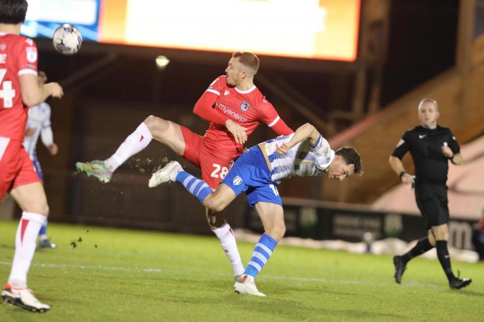 Balancing act - Colchester United goalscorer Tom Hopper battles for the ball during his side's win over Grimsby Town <i>(Image: STEVE BRADING)</i>