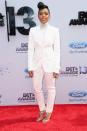 <p>Janelle Monae ne porte que du noir et du blanc mais avait laissé tomber le noir, le temps d'un soir, lors des BET Awards 2013 le 30 juin 2013 à Los Angeles, Californie. <i>(Photo : Frederick M. Brown/Getty Images for BET)</i></p>