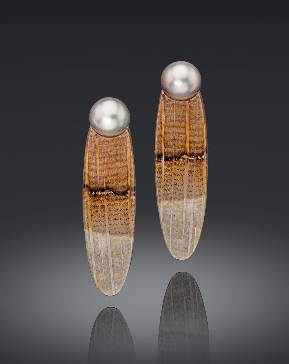 <p><a href="https://assael.com/product/fijian-pearl-and-petrified-golden-oak-earrings/" rel="nofollow noopener" target="_blank" data-ylk="slk:Shop Now;elm:context_link;itc:0;sec:content-canvas" class="link ">Shop Now</a></p><p>Fijian Pearl and Petrified Golden Oak Earrings</p><p>Assaek</p>