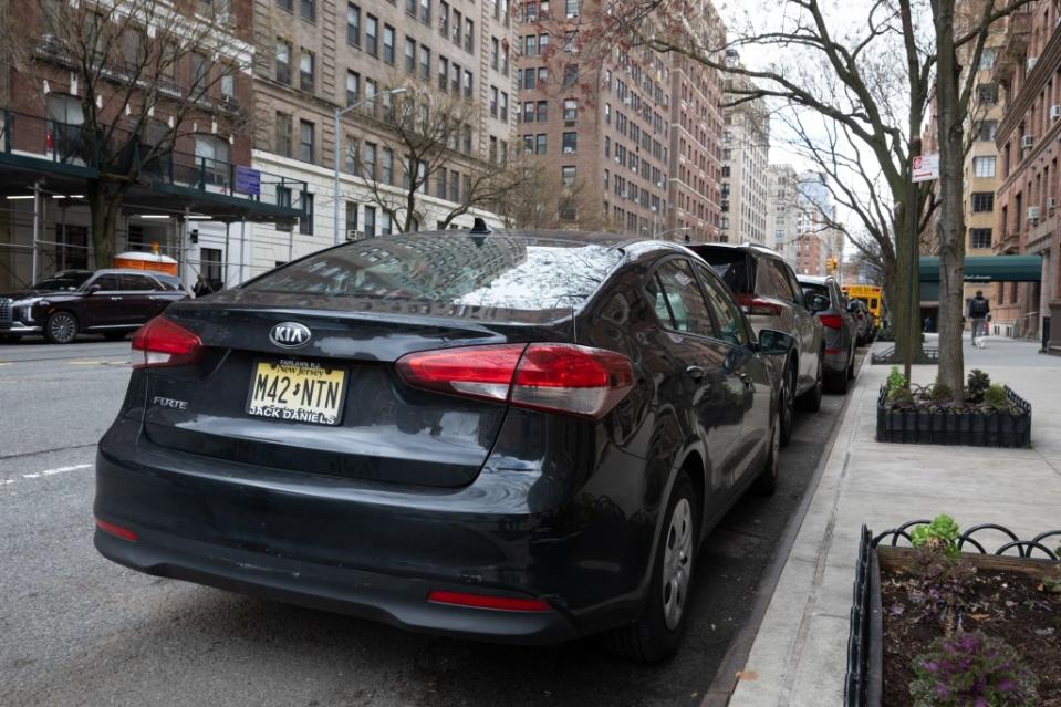 New Jersey-registered vehicles line Riverside Drive. J.C. Rice