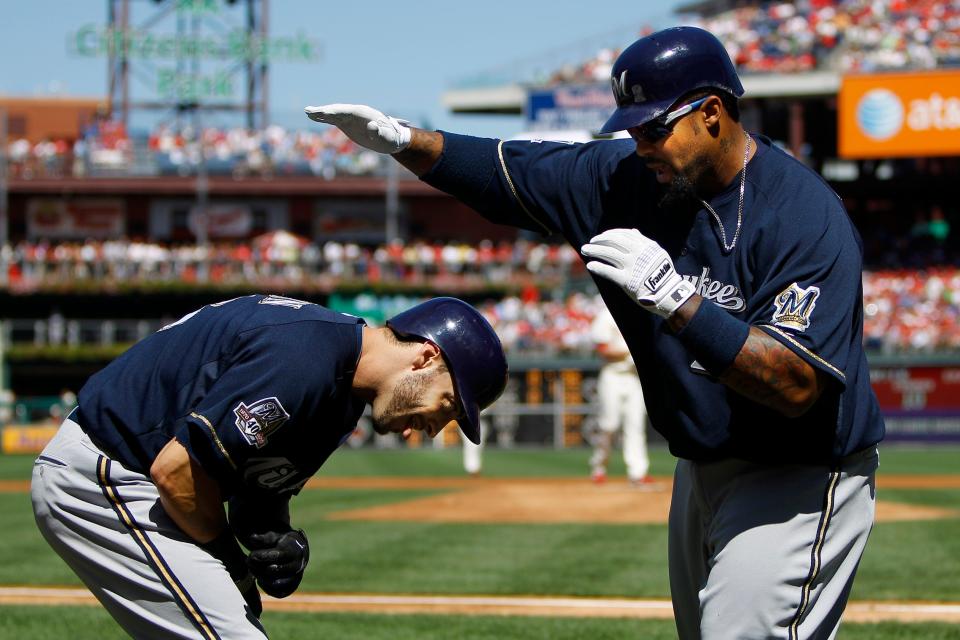 Prince Fielder, right, and Ryan Braun celebrate Fielder's three-run home run by shadow boxing in the first inning of a game against the Philadelphia Phillies on Sept. 5, 2010.