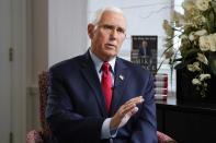 Former Vice President Mike Pence sits for an interview with the Associated Press, Wednesday, Nov. 16, 2022, in New York. (AP Photo/John Minchillo)