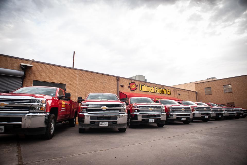 Pickup trucks line up in front of Lubbock Electric Co., 1108 34th St.