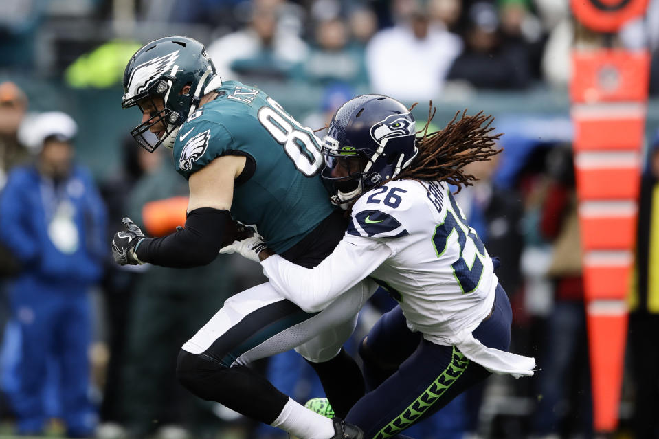 Philadelphia Eagles' Zach Ertz (86) is tackled by Seattle Seahawks' Shaquill Griffin (26) during the first half of an NFL football game, Sunday, Nov. 24, 2019, in Philadelphia. (AP Photo/Matt Rourke)
