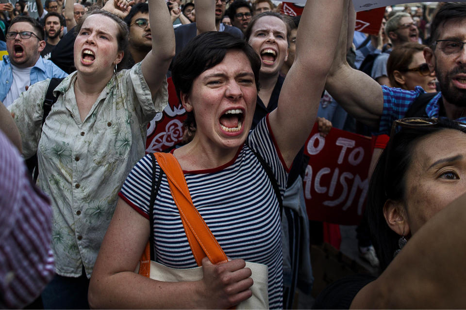 <p>People protest during a rally about the U.S. Supreme Court’s decision to uphold President Donald Trumpâs ban on travel from several mostly Muslim countries, Tuesday, June 26, 2018, in New York. (Photo: Andres Kudacki/AP) </p>