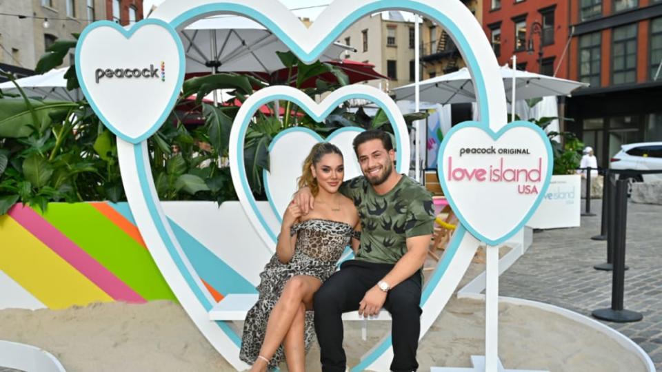 “Love Island USA” season 2 star Cely Vazquez and UK Love Islander Kem Centinay pose outside the activation (<em>Photo credit: Bryan Bedde</em>r)