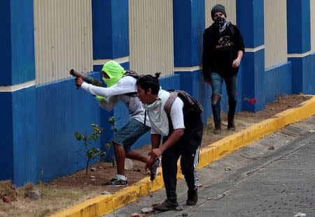 A university student holds a homemade mortar during a protest over a controversial reform to the pension plans of the Nicaraguan Social Security Institute (INSS) in Managua, Nicaragua April 20, 2018. REUTERS/Oswaldo Rivas