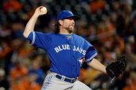 Sep 30, 2015; Baltimore, MD, USA; Toronto Blue Jays starting pitcher R.A. Dickey (43) pitches during the third inning against the Baltimore Orioles at Oriole Park at Camden Yards. Tommy Gilligan-USA TODAY Sports