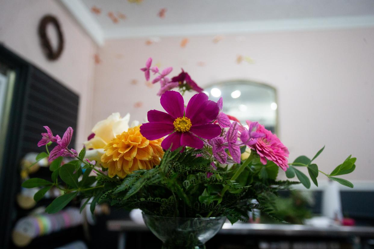 Flowers are arranged in a vase at Pat's European Fresh Flower Market.