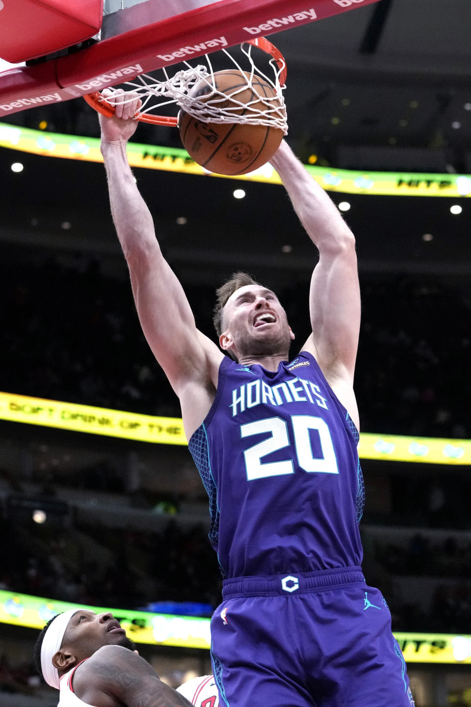 FILE - Charlotte Hornets forward Gordon Hayward dunks against the Chicago Bulls during the second half of an NBA basketball game in Chicago, Wednesday, Dec. 6, 2023. The Charlotte Hornets are sending often-injured small forward Gordon Hayward to the Oklahoma City Thunder in exchange for guard Tre Mann, power forward Davis Bertans, point guard Vasilije Micic and two second round draft picks, according to a person familiar with the situation. The person spoke to The Associated Press on condition of anonymity Thursday, Feb. 8, 2024, because the deal has not yet been approved by the league.(AP Photo/Nam Y. Huh, File)
