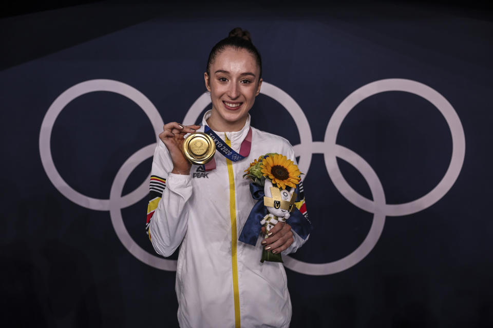 Nina Derwael of Team Belgium poses with the gold medal