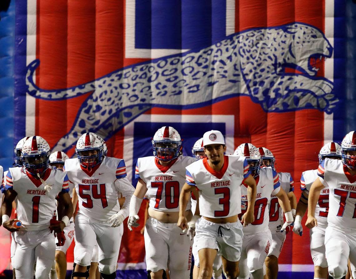 The Heritage Jaguar’s enter the field for the second half of a District 5-5A Division II high school football game at Midlothian ISD Multi-use Stadium in Midlothian, Texas, Friday, Oct. 14, 2022. Midlothian defeated Ennis 38-35. (Special to the Star-Telegram Bob Booth) Bob Booth/Bob Booth