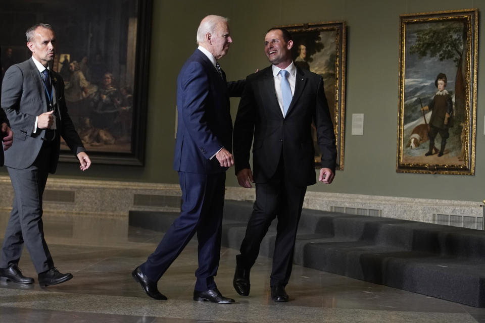 U.S. President Joe Biden and Malta's Prime Minister Robert Abela talk during a visit to the Prado museum with heads of state and dignitaries in Madrid, Spain, Wednesday, June 29, 2022. North Atlantic Treaty Organization heads of state are meeting for a NATO summit in Madrid from Tuesday through Thursday. (AP Photo/Andrea Comas)