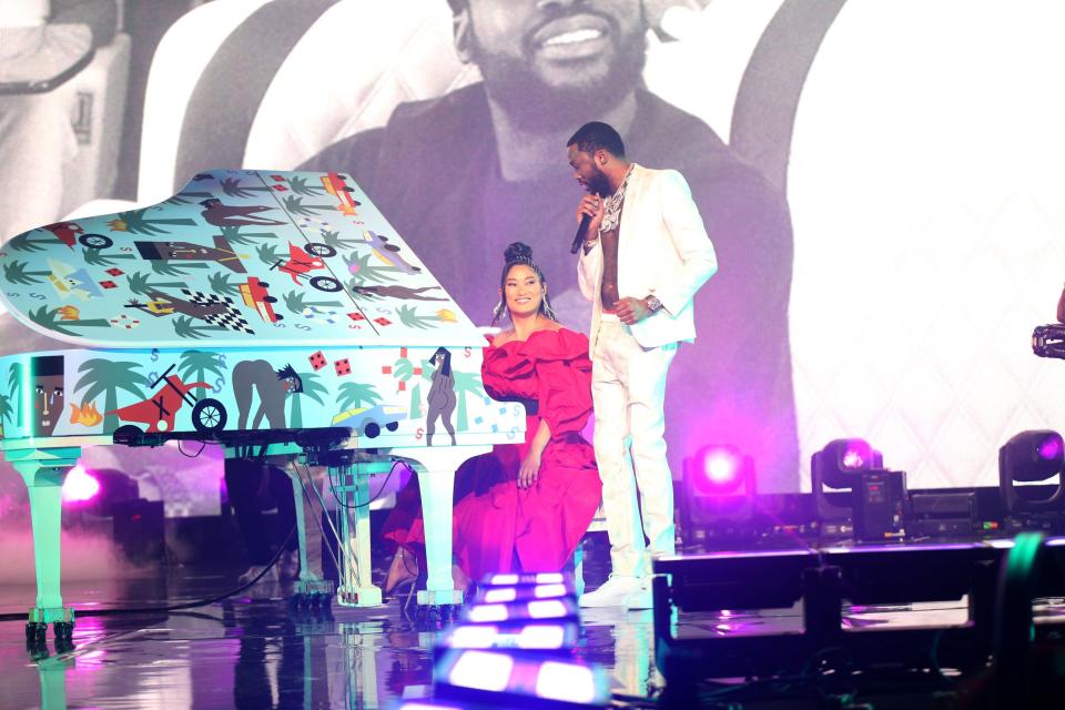 Chloe Flower and Meek Mill onstage at Madison Square Garden. - Credit: Courtesy