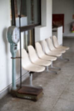 <span class="caption">Weighting room.</span> <span class="attribution"><a class="link " href="https://www.shutterstock.com/image-photo/white-chairs-body-weight-scale-on-535845988?src=_okKn2uPkfVTK1NjVHgTLQ-1-55" rel="nofollow noopener" target="_blank" data-ylk="slk:coasehsieh/Shutterstock;elm:context_link;itc:0;sec:content-canvas">coasehsieh/Shutterstock</a></span>