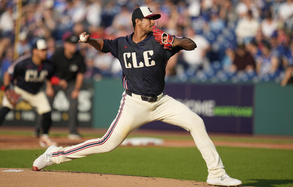 Cleveland Guardians' Carlos Carrasco pitches to a Toronto Blue Jays batter during the first inning of a baseball game Friday, June 21, 2024, in Cleveland. (AP Photo/Sue Ogrocki)