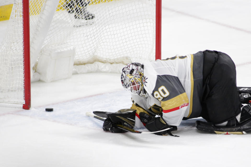 Vegas Golden Knights goaltender Robin Lehner reacts after a goal was scored by Minnesota Wild left wing Kirill Kaprizov (97) in the third period during an NHL hockey game, Monday, May 3, 2021, in St. Paul, Minn. (AP Photo/Andy Clayton-King)