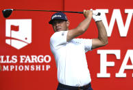 Gary Woodland watches his drive from the 16th tee during the second round of the Wells Fargo Championship golf tournament at Quail Hollow Club in Charlotte, N.C., Friday, May 7, 2021. (Jeff Siner/The Charlotte Observer via AP)