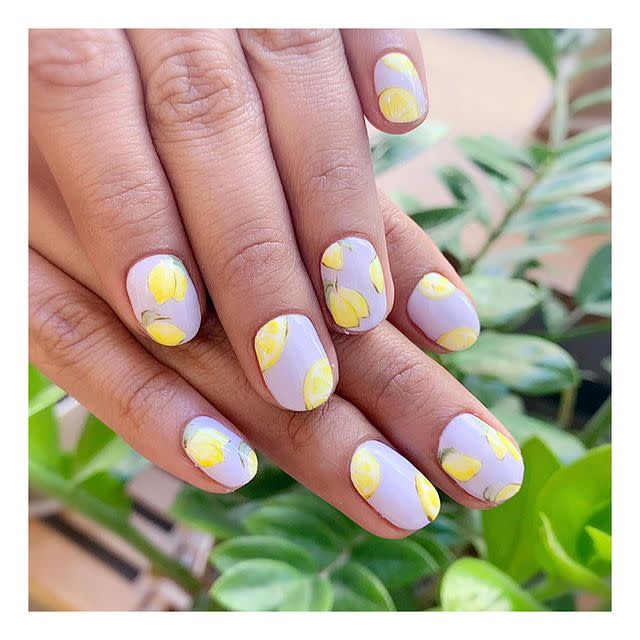 15) This Yellow and Purple Design for Easter Nails