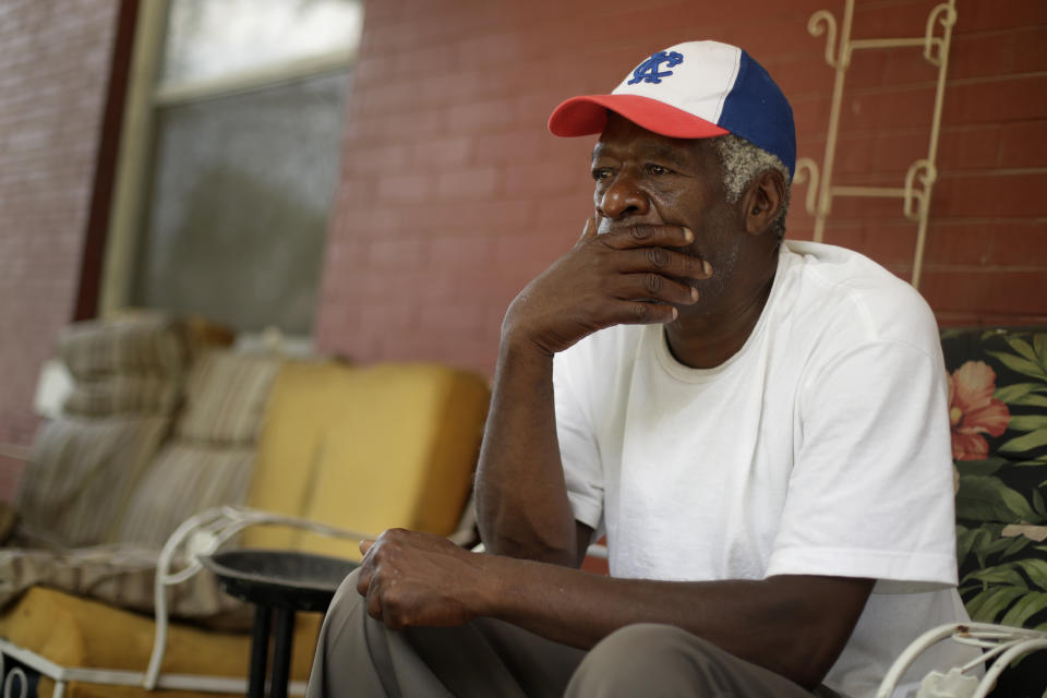 Gerald Armstrong recalls his time working for the old Kansas City Athletics as an attendant and ball boy in the visitor's clubhouse as he speaks from the front porch of the home where he grew up and now lives in Kansas City, Mo., on Friday, June 26, 2020. Armstrong is one of more than a dozen Black men who said they were sexually molested by former Red Sox clubhouse manager Donald "Fitzy" Fitzpatrick when they were youths. (AP Photo/Charlie Riedel)