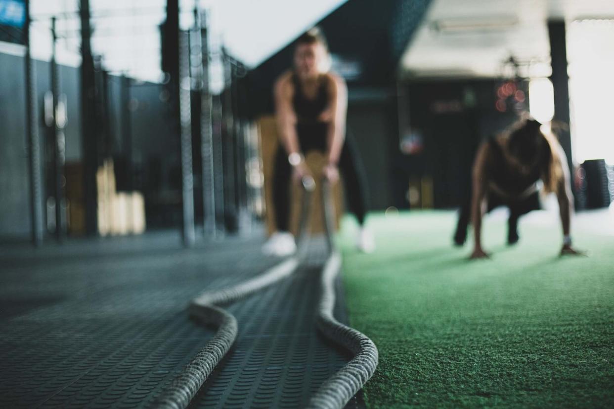 Two persons exercising