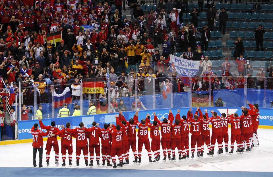 Olympic athletes from Russia celebrate after winning the men's gold medal hockey game against Germany, 4-3, in overtime at the 2018 Winter Olympics, Sunday, Feb. 25, 2018, in Gangneung, South Korea. (AP Photo/Jae C. Hong)