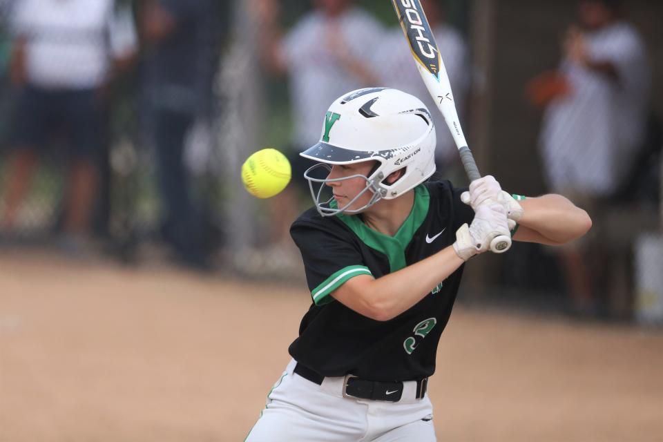 Yorktown softball's Lizzy Willis takes a ball in their regional championship game against Bellmont at Yorktown Sports Park on Tuesday, May 31, 2022.