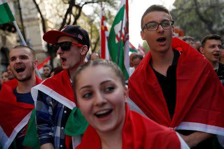 People attend a protest against the government of Prime Minister Viktor Orban in Budapest, Hungary, April 14, 2018. REUTERS/Bernadett Szabo