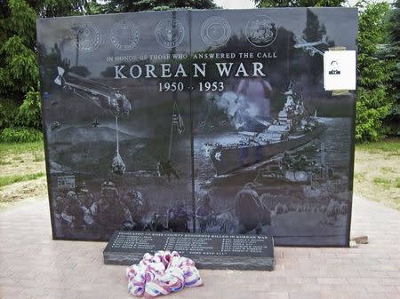 A stone memorial commemorating locals who fought and died in the Korean War is seen after being unveiled at Ross County Veterans Memorial Park in Chillicothe, Ohio, in this May 28, 2014 handout provided by Tina Kutschbach. REUTERS/Tina Kutschbach/Handout via Reuters