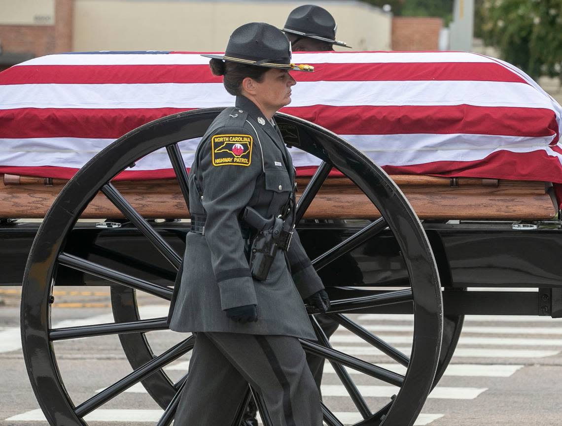 The North Carolina State Highway Patrols Caisson Unit carrying Wake County Deputy Ned Byrds proceeds along Glenwood Avenue to Providence Baptist Church for his funeral on Friday, August 19, 2022 in Raleigh, N.C.