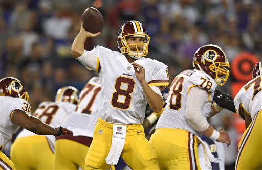 Washington Redskins quarterback Kirk Cousins (8) throws to a receiver in the first half of a preseason NFL football game against the Baltimore Ravens, Saturday, Aug. 29, 2015, in Baltimore. (AP Photo/Gail Burton)