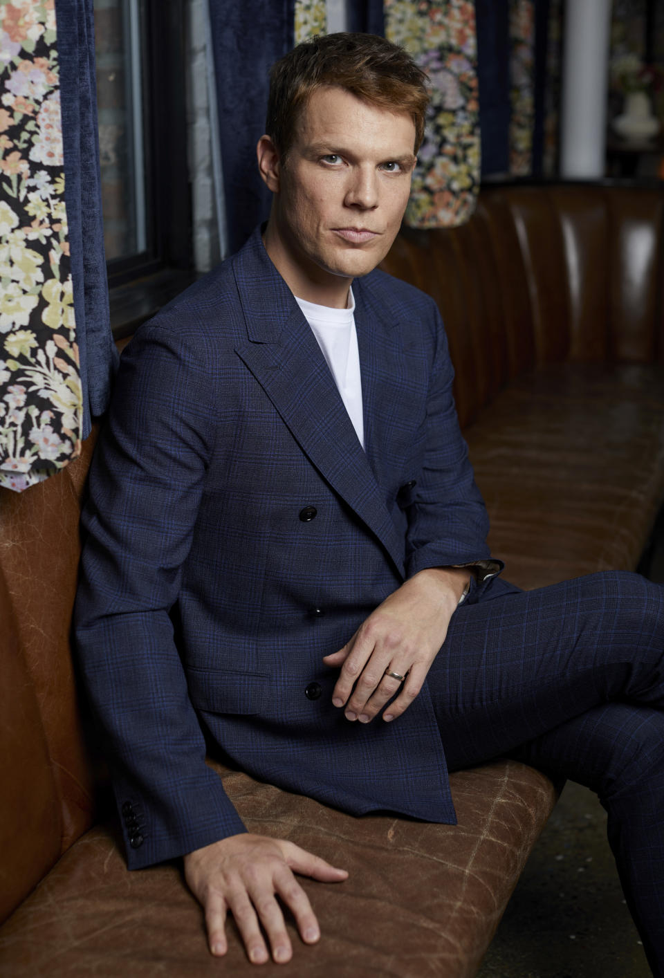 Jake Lacy poses for portraits on Wednesday, Sept. 28, 2022, in New York to promote his Peacock limited series “A Friend of the Family." (Photo by Matt Licari/Invision/AP)