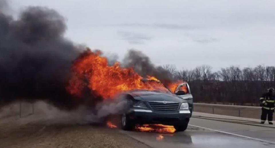 The car became engulfed with the flames in Wisconsin. Source: WITI