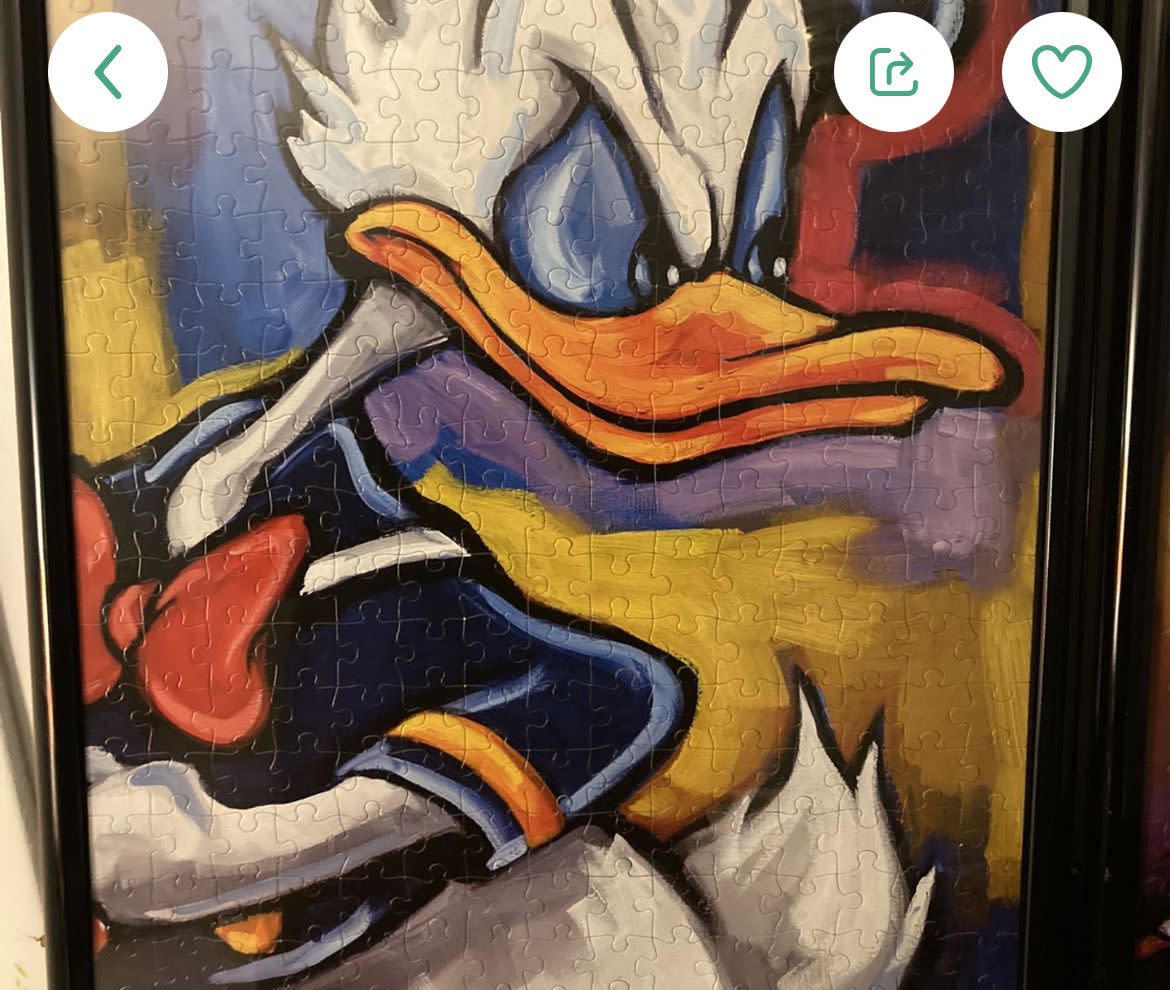 a framed donald duck puzzle