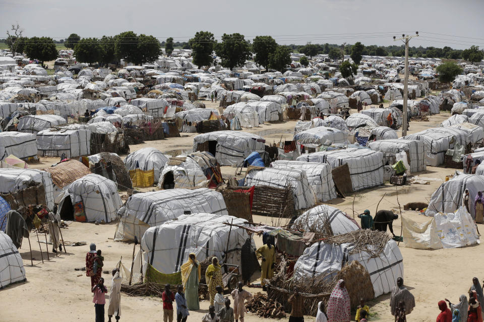 FILE - A top view of one of the biggest camp for people displaced by Islamist extremists in Maiduguri, Nigeria on Aug. 28, 2016. Droughts, flooding and a shrinking Lake Chad caused in part by climate change is fueling conflict and migration in the region and needs to better addressed, a report said Thursday, Jan. 19, 2023. ( AP Photo/Sunday Alamba, File)