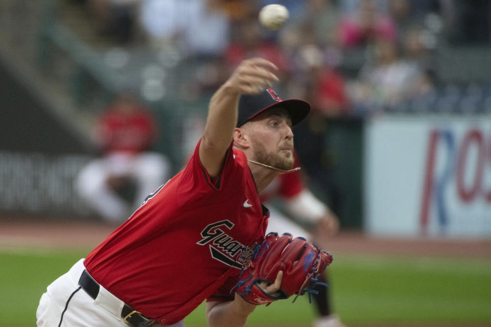 CORRECTS TO LOS ANGELES ANGELS NOT CALIFORNIA ANGELS - Cleveland Guardians starting pitcher Tanner Bibee delivers against the Los Angeles Angels during the first inning of a baseball game in Cleveland, Friday, May 3, 2024. (AP Photo/Phil Long)