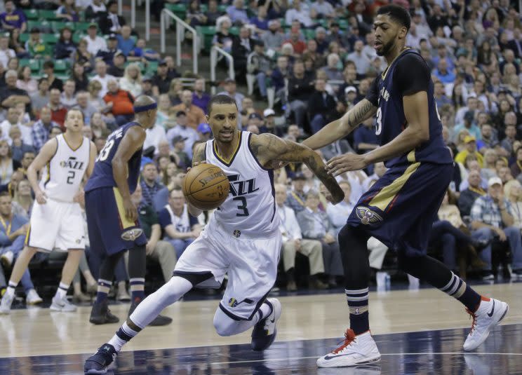 George Hill gives the Kings a veteran presence at the point. (AP)