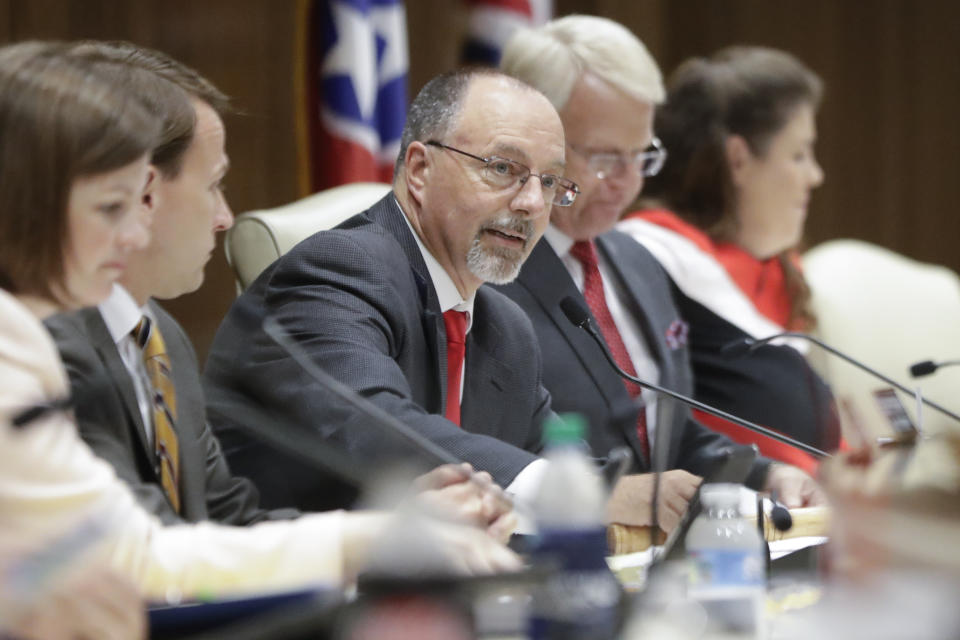 Senator Mike Bell, R-Riceville, center, chairs a Senate hearing to discuss a fetal heartbeat abortion ban, or possibly something more restrictive, Monday, Aug. 12, 2019, in Nashville, Tenn. (AP Photo/Mark Humphrey)