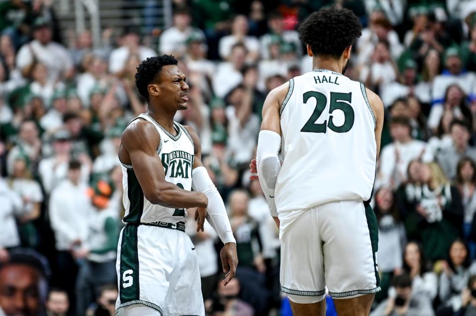 Michigan State's Tyson Walker, left, celebrates with Malik Hall after Hall's score against Maryland during the first half on Saturday, Feb. 3, 2024, at the Breslin Center in East Lansing.