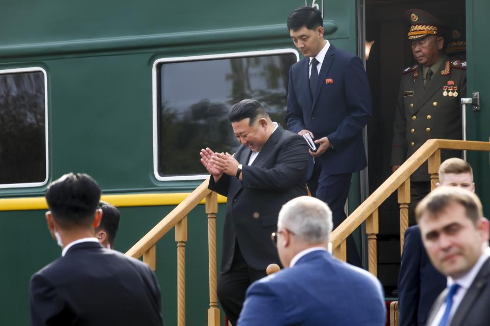 In this photo released by Government of the Russian far eastern region of Primorsky Krai, North Korea's leader Kim Jong Un gestures as he steps down from his train after arriving in Artyom, near Vladivostok, Russian Far East on Saturday, Sept. 16, 2023. (Governor of the Russian far eastern region of Primorsky Krai Oleg Kozhemyako telegram channel via AP)