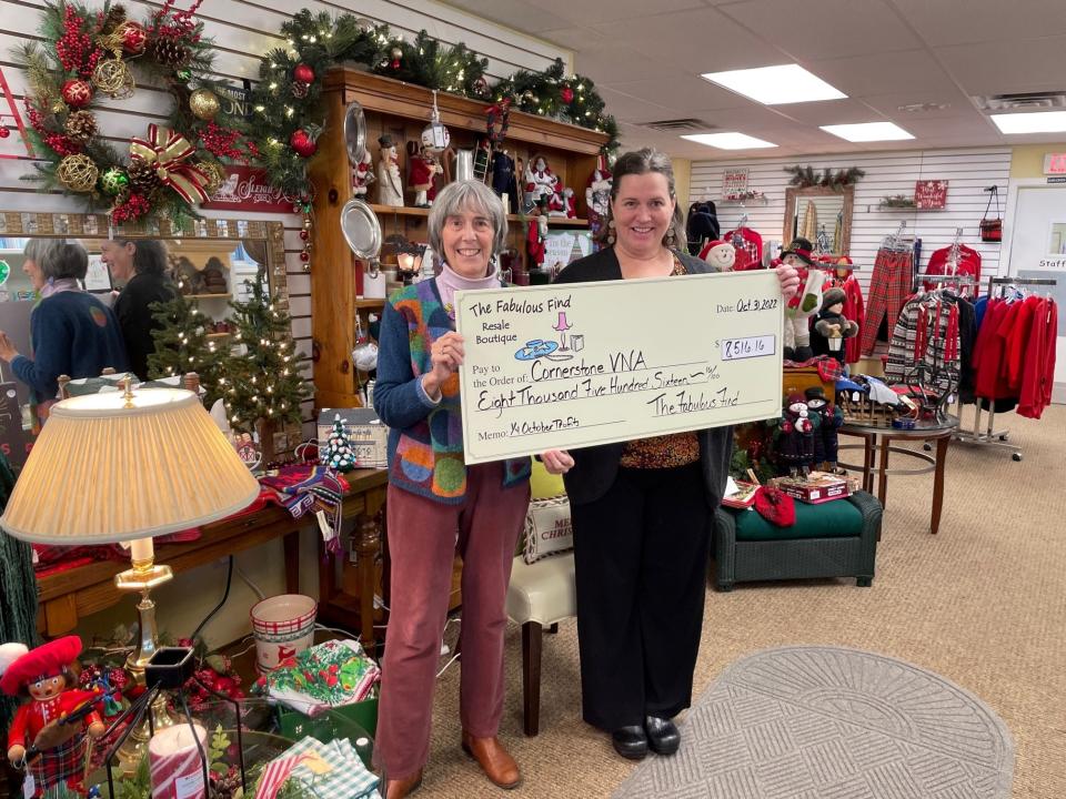 Ann Vennard, assistant director of advancement at Cornerstone VNA, right, accepts a generous donation from Anne Hunter of The Fabulous Find.