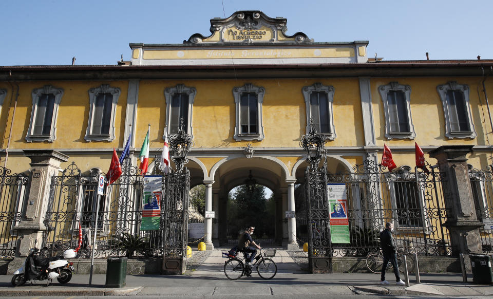 FILE - In this Tuesday, April 7, 2020 file photo, a view of the Pio Albergo Trivulzio nursing home, in Milan, Italy. Italy’s biggest nursing home is defending the measures it took to protect residents and staff from the coronavirus amid a criminal investigation and family outrage over 300 deaths from January-April. Officials representing the Pio Albergo Trivulzio home in Milan denied claims from staff that management told them not to wear masks for fear of spooking residents and insisted they followed all relevant safety guidelines. (AP Photo/Antonio Calanni, File )