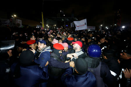 Demonstrators take part in a protest against the government's tough austerity measures in Amman, Jordan December 13, 2018. REUTERS/Muhammad Hamed