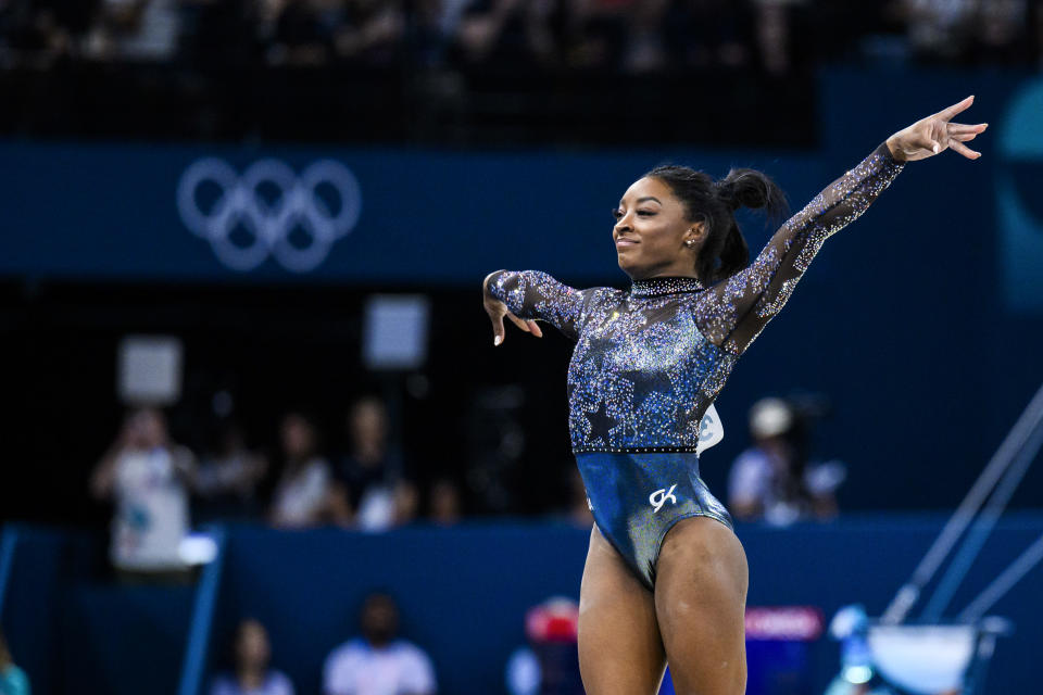 Simone Biles battled leg pain while getting off to a dominant start at the Paris Olympics (Tom Weller/VOIGT/Getty Images)