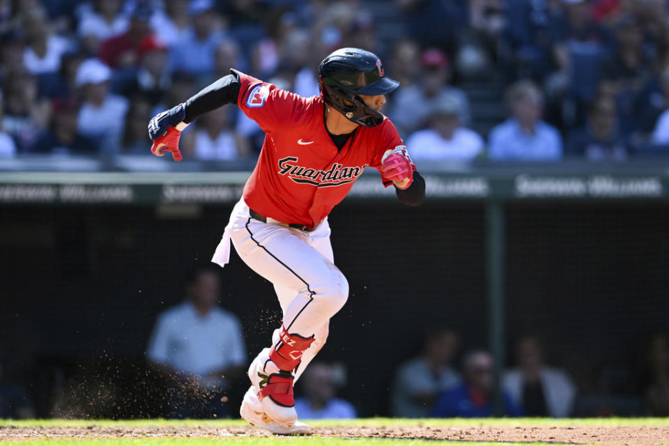 Cleveland Guardians’ Andrés Giménez runs out an infield single during the sixth inning of a baseball game against the Minnesota Twins, Thursday, Sept. 19, 2024, in Cleveland. (AP Photo/Nick Cammett)