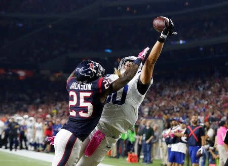 Oct 8, 2015; Houston, TX, USA; Indianapolis Colts tight end Coby Fleener (80) has the ball knocked away in the end zone by Houston Texans cornerback Kareem Jackson (25) at NRG Stadium. Matthew Emmons-USA TODAY Sports