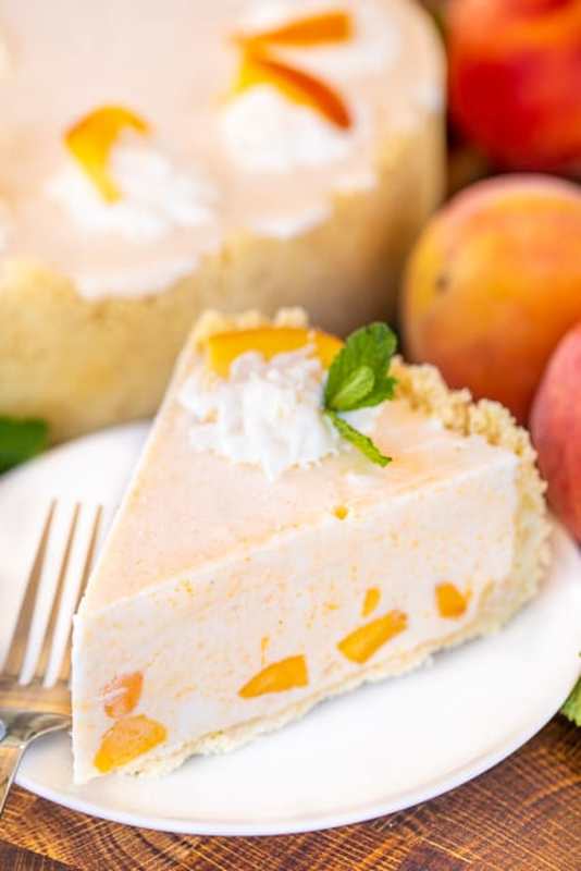 <p>Plain Chicken</p><p>Inspired by The Masters' peach ice cream sandwiches, this pie is sure to be a winner.</p><p><strong>Get the recipe: <a href="https://www.plainchicken.com/peach-ice-cream-pie/" rel="nofollow noopener" target="_blank" data-ylk="slk:Peach Ice Cream Pie;elm:context_link;itc:0;sec:content-canvas" class="link rapid-noclick-resp">Peach Ice Cream Pie</a></strong></p>